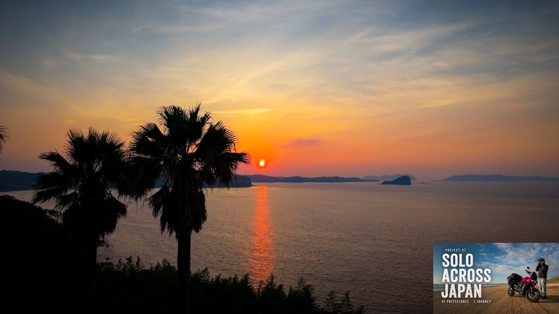 Sunset over the Saga coastline during a solo motorcycle camping journey across Japan