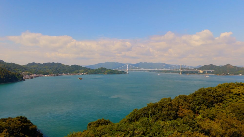 View across the Seto Inland Sea toward a bridge on the Shimanami Kaido